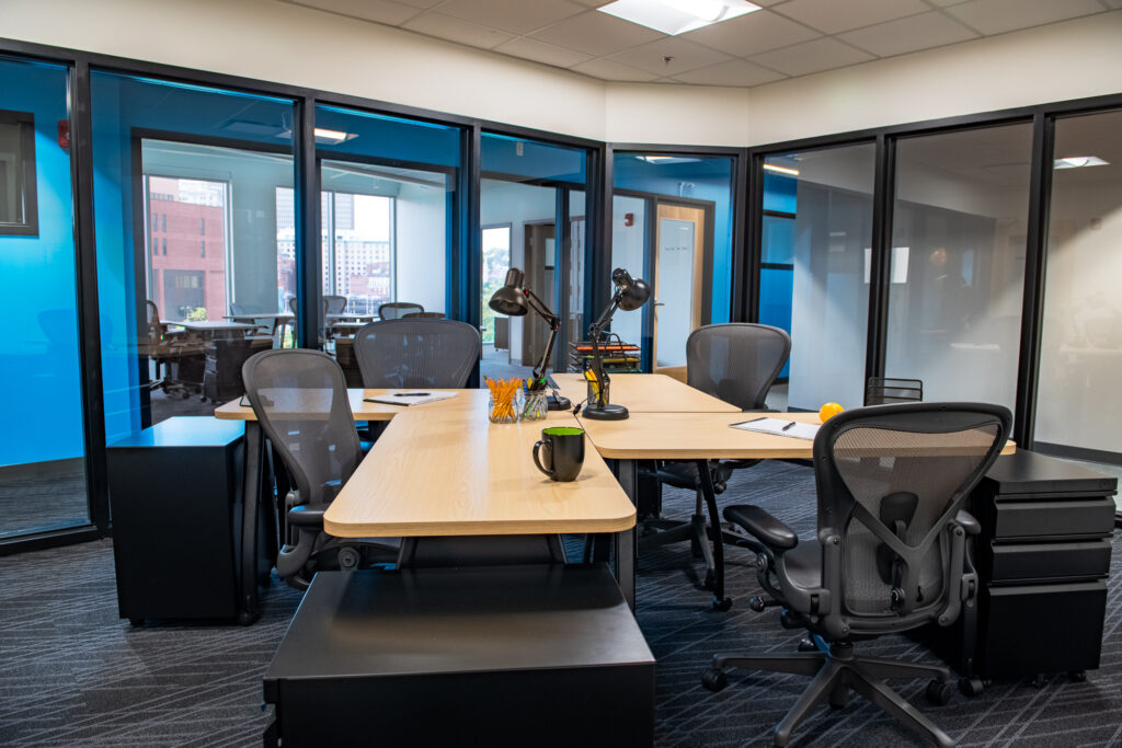 Private office at CIC Providence glass walls and standard CIC furniture.