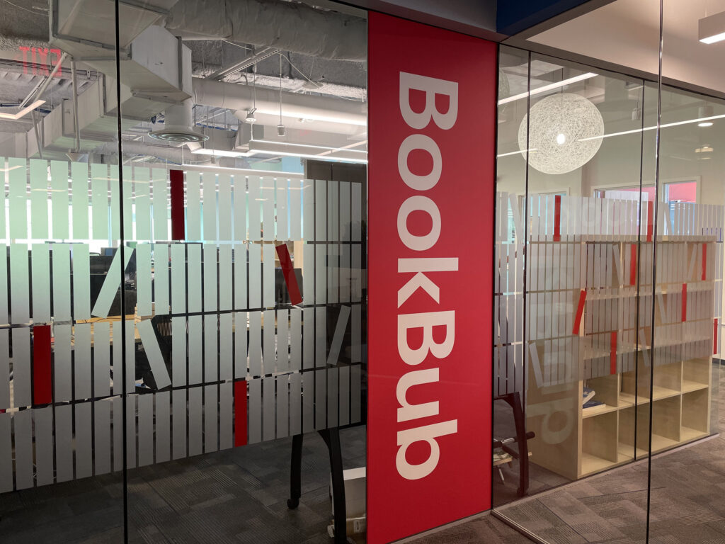 Bookbub column branding on the outside of a CIC private office