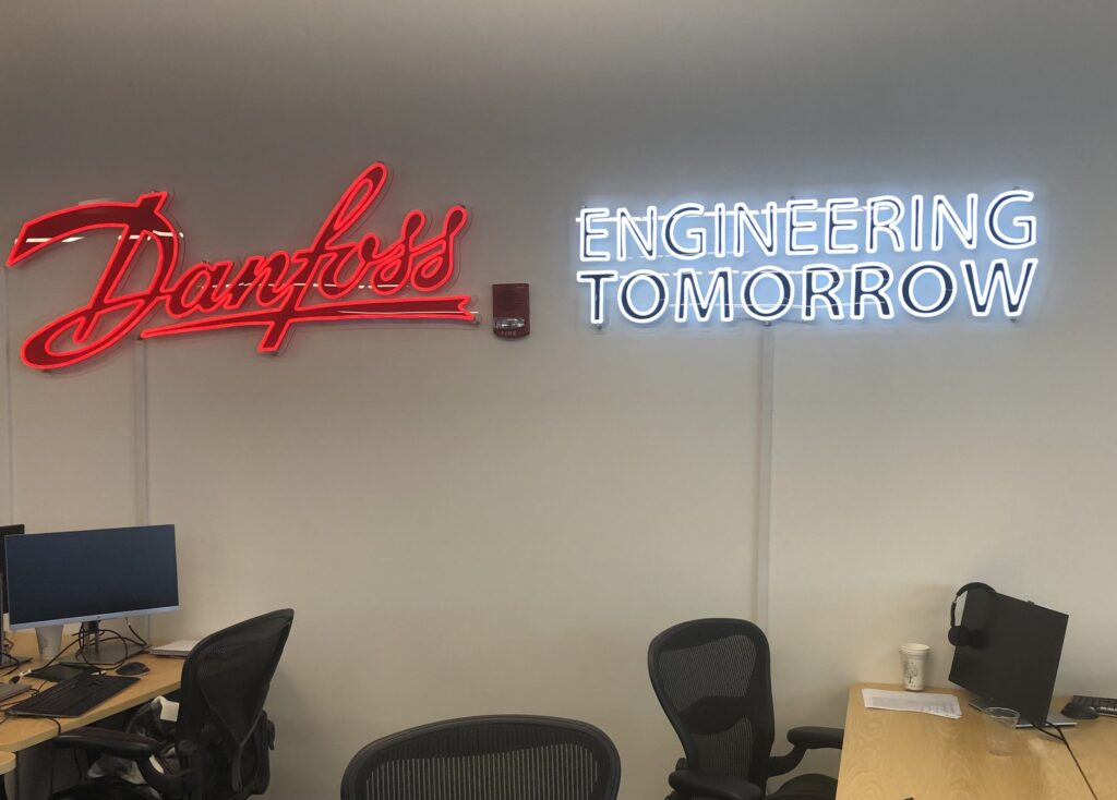 Custom signage installed on the inside of a CIC private office