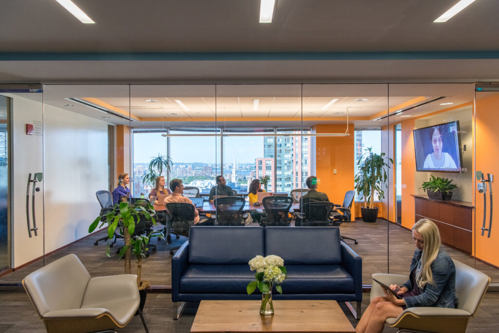 Large conference room with city and river views at CIC Boston