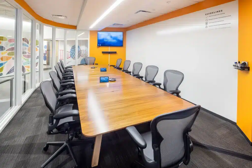 Large conference room at CIC Philadelphia, with a whiteboard wall and television.
