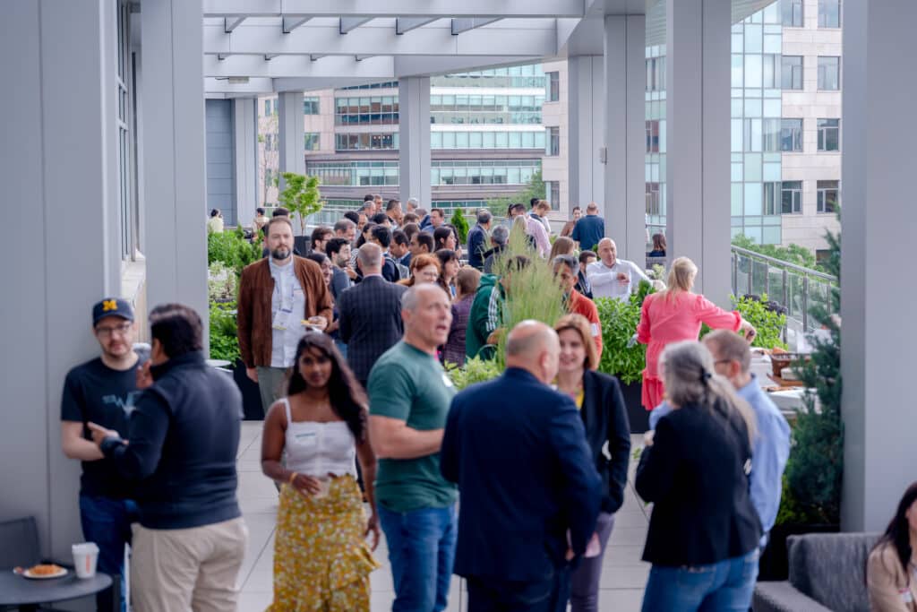 People mingling at a networking event at CIC Cambridge