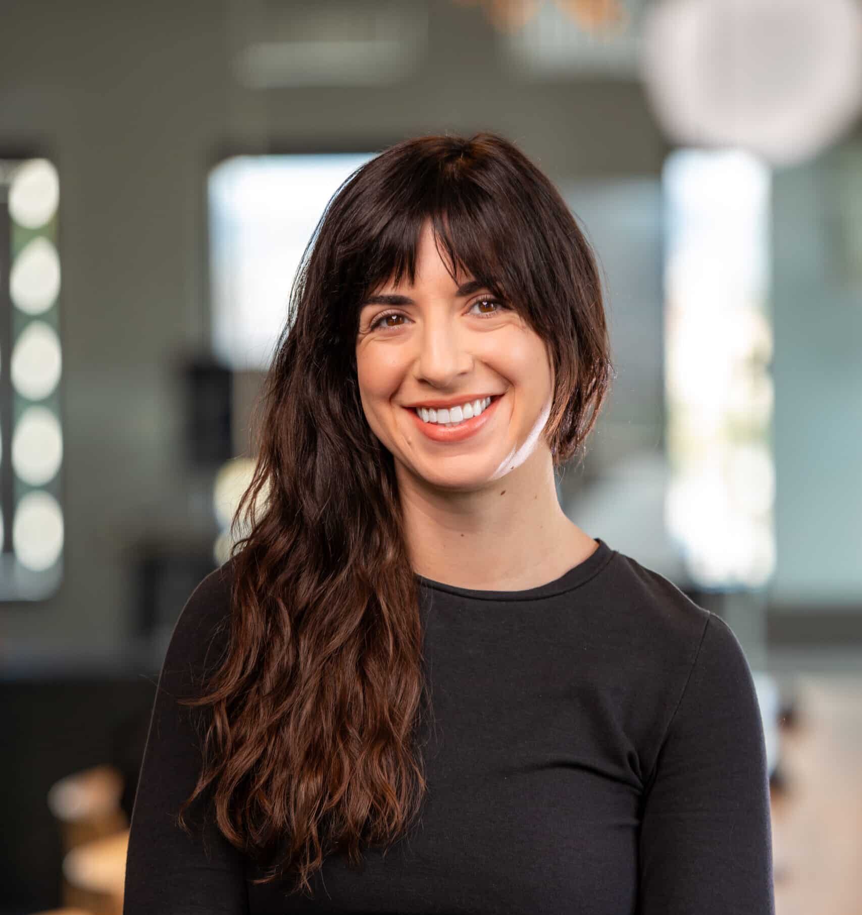 Headshot of CIC staff member Kat Lazell.